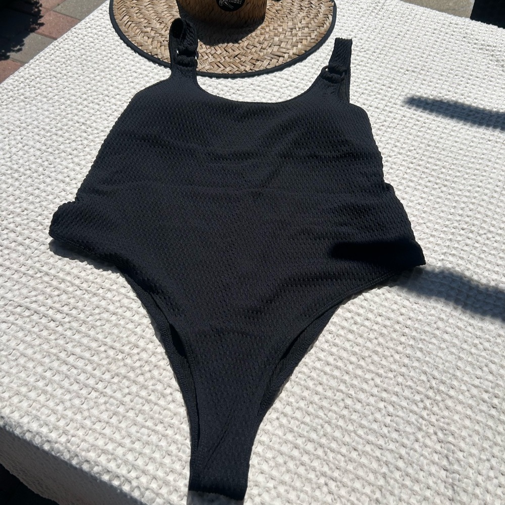 Cheeky woman’s  Black One Piece Swimsuit